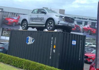 Mazda truck on display on an NZBOX container