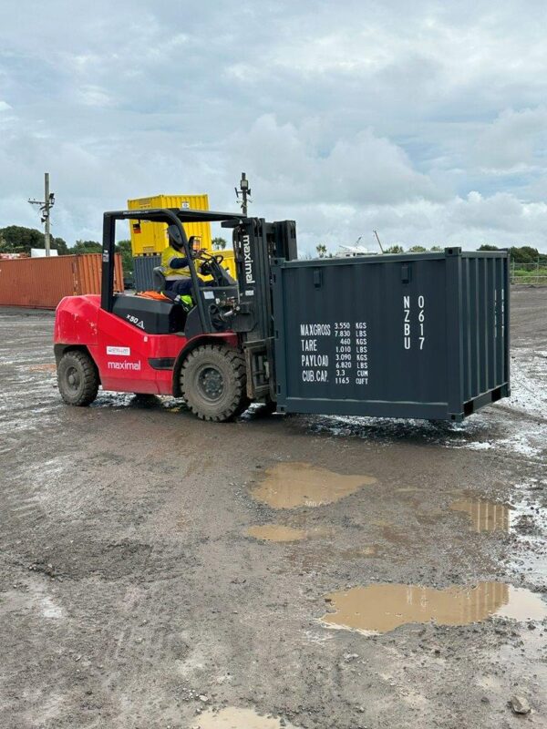 6ft Grey Shipping Container on Forklift